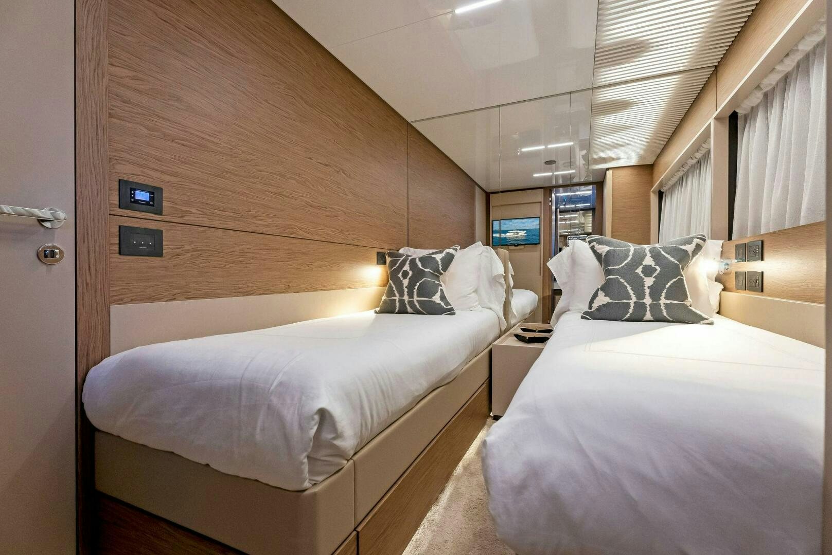 a room with two beds aboard SILHOUETTE Yacht for Sale