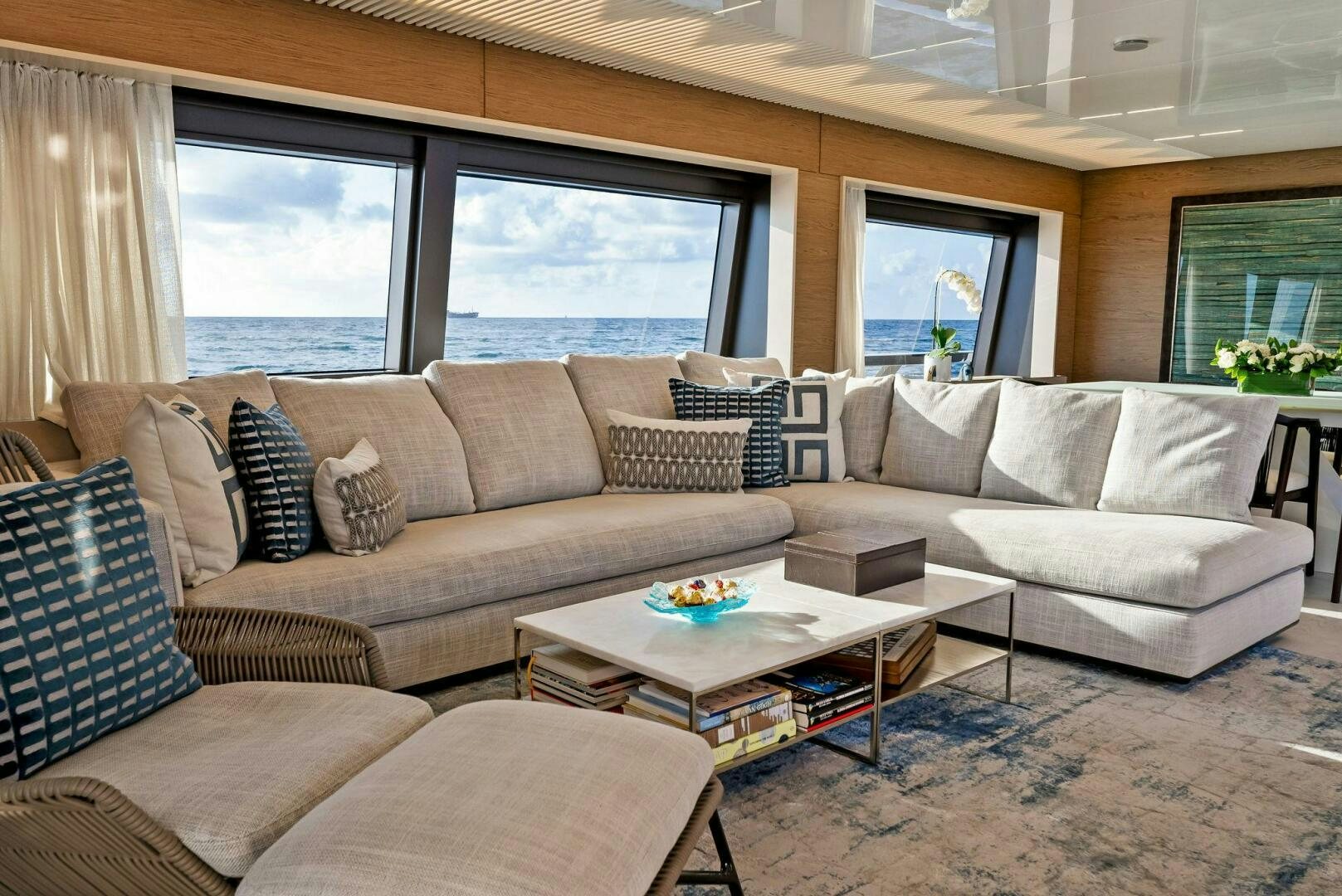 a living room with a large window aboard SILHOUETTE Yacht for Sale