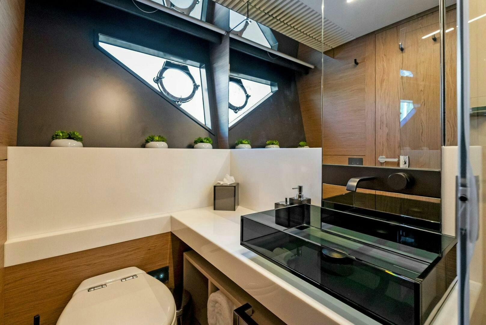 a kitchen with a large window aboard SILHOUETTE Yacht for Sale