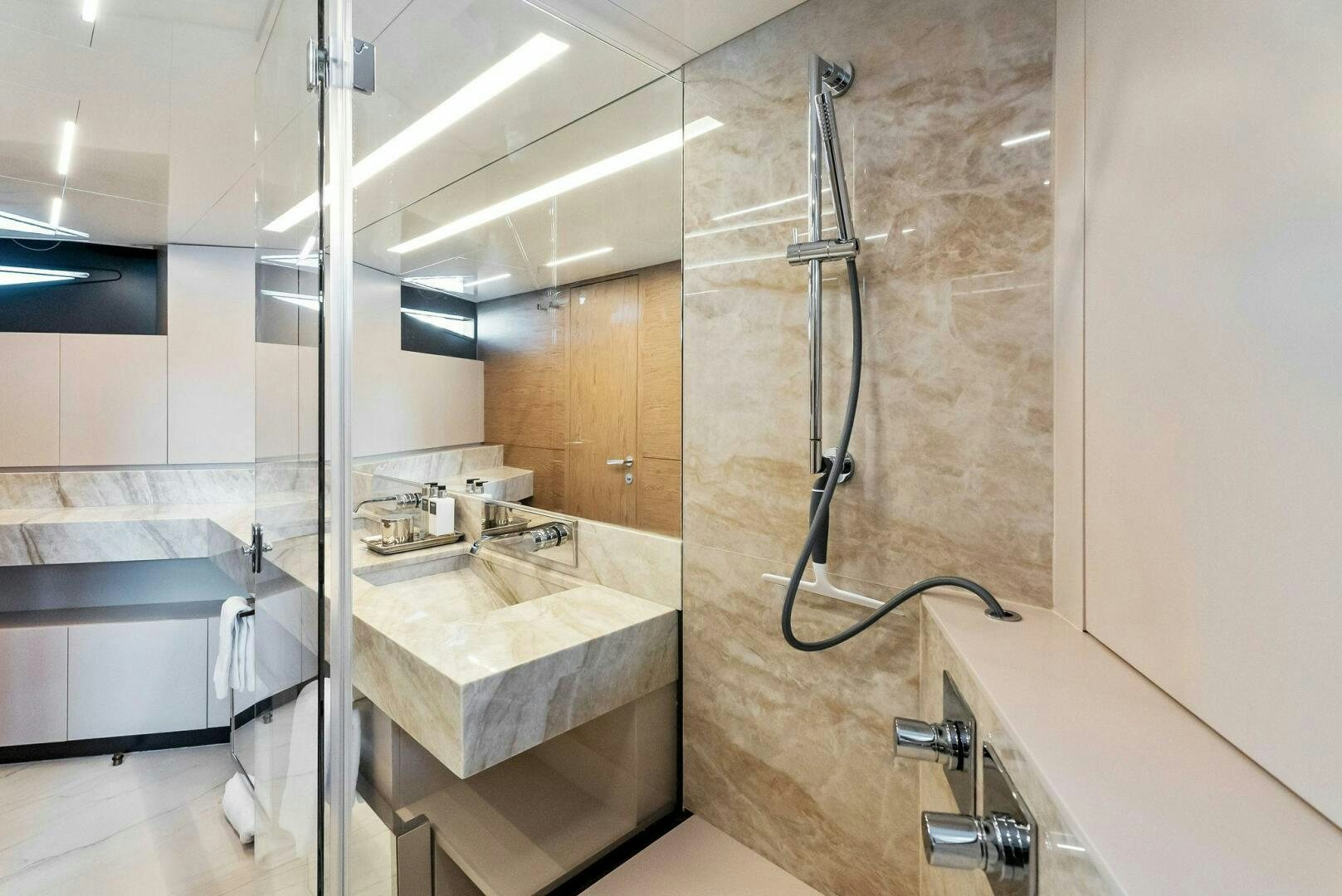 a bathroom with a sink and a shower aboard SILHOUETTE Yacht for Sale