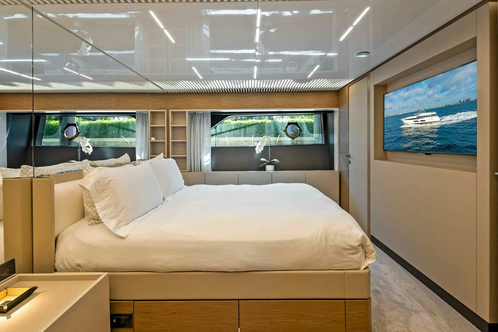 a room with a bed and a window aboard SILHOUETTE Yacht for Sale