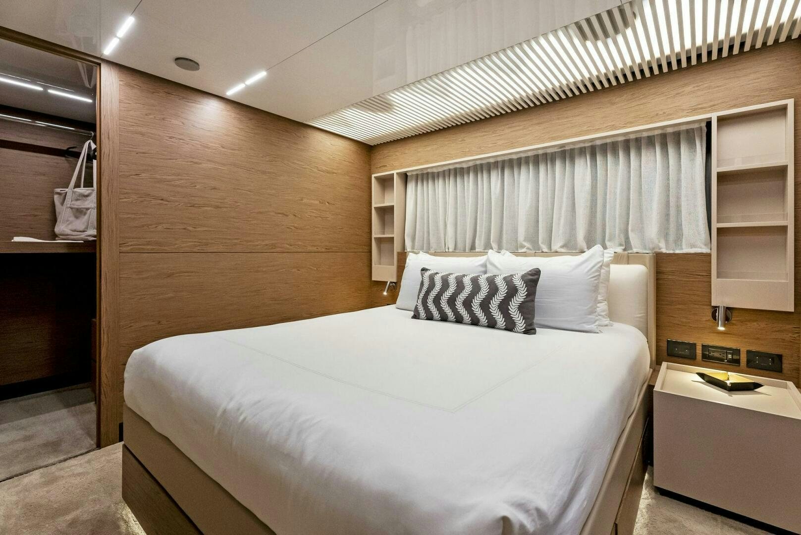 a bed in a room aboard SILHOUETTE Yacht for Sale