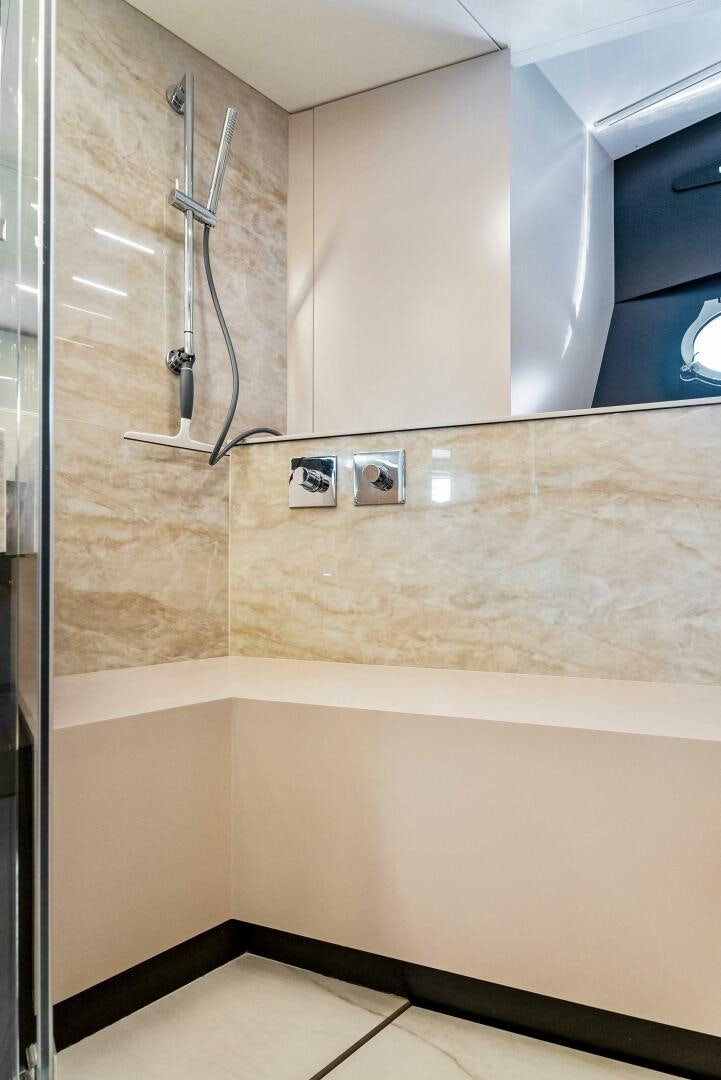 a bathroom with a large mirror aboard SILHOUETTE Yacht for Sale