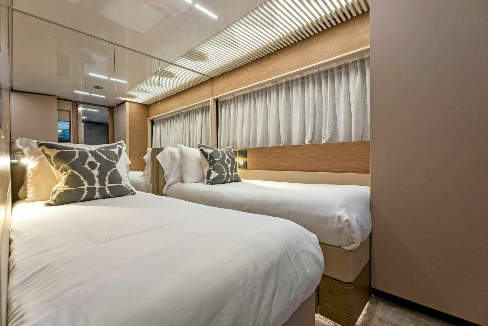 a room with two beds aboard SILHOUETTE Yacht for Sale