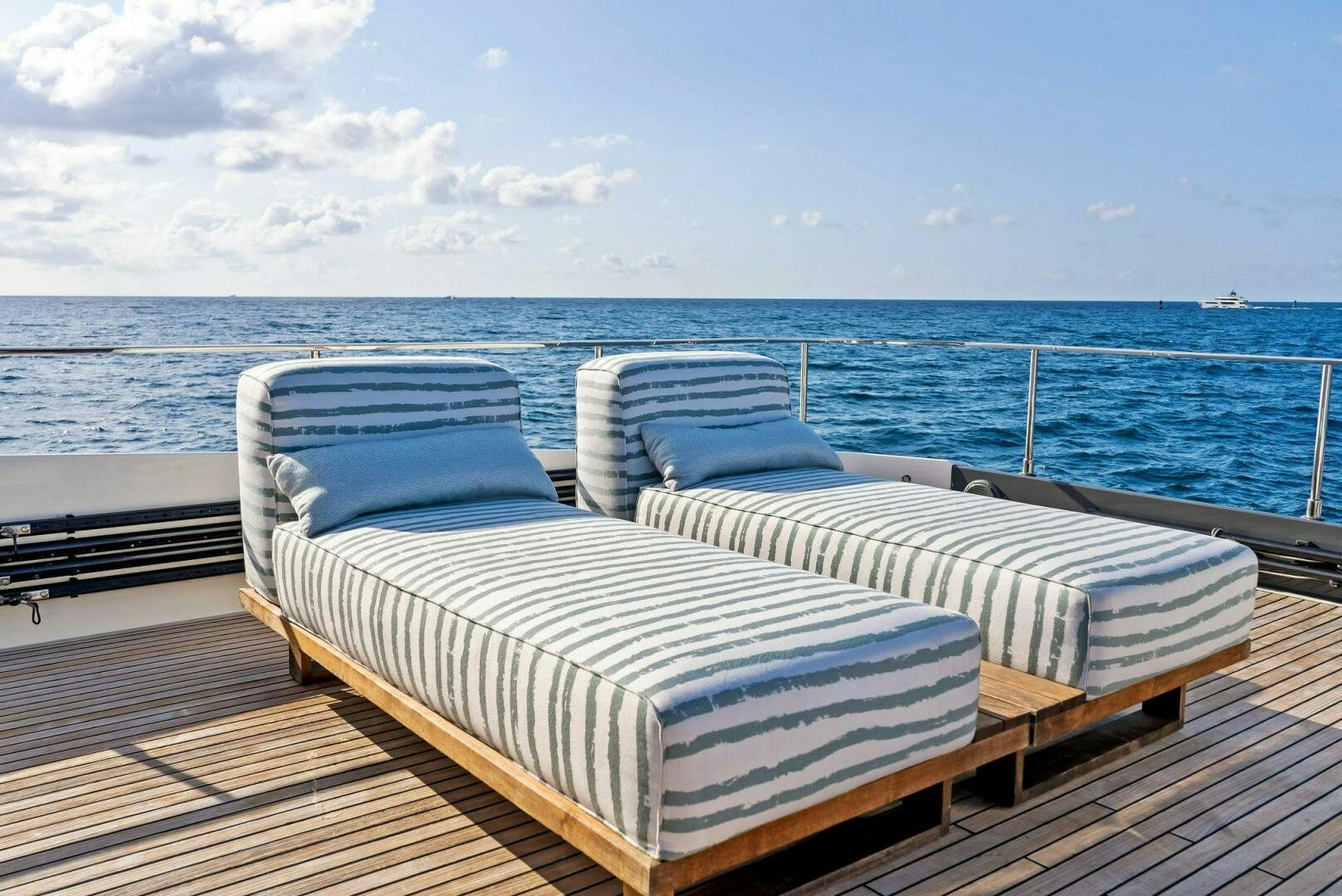 a deck with beds on it aboard SILHOUETTE Yacht for Sale