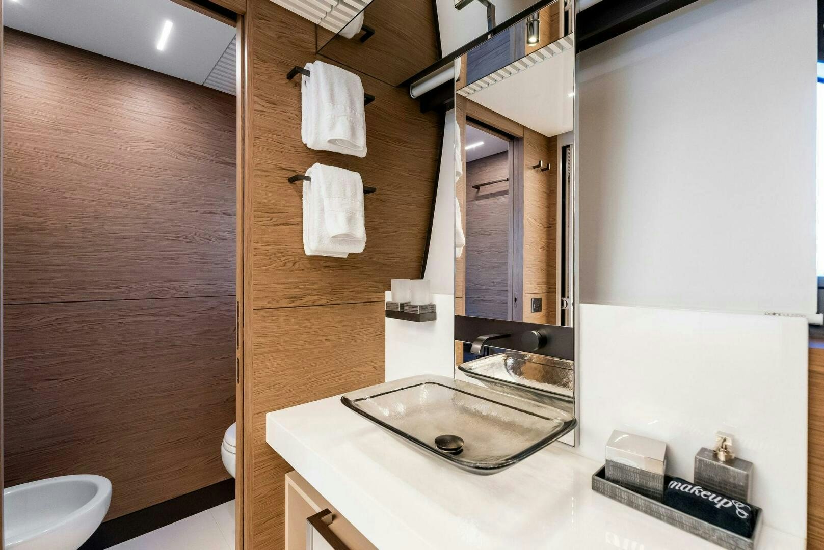 a bathroom with a sink and a mirror aboard SILHOUETTE Yacht for Sale