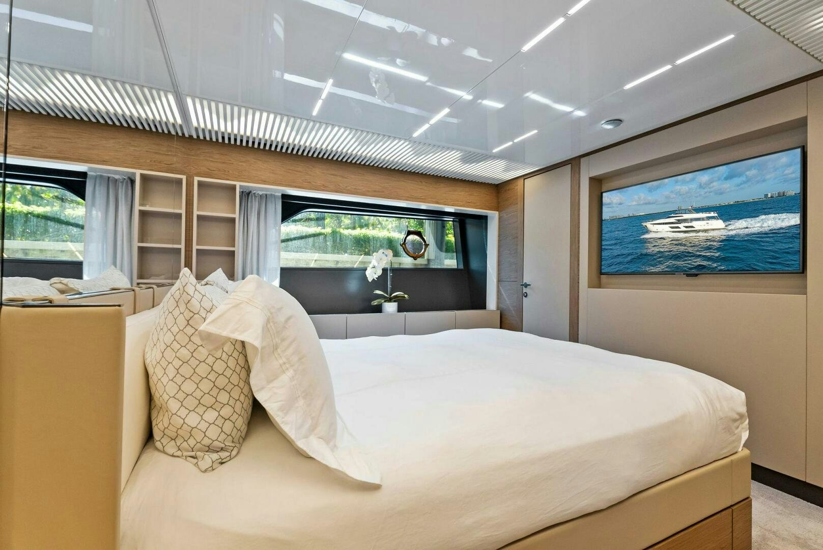 a room with a bed and a window aboard SILHOUETTE Yacht for Sale