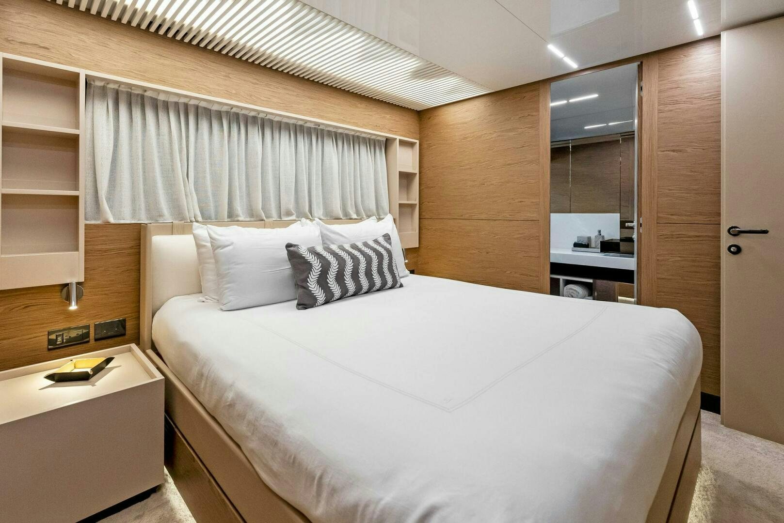a bed in a room aboard SILHOUETTE Yacht for Sale