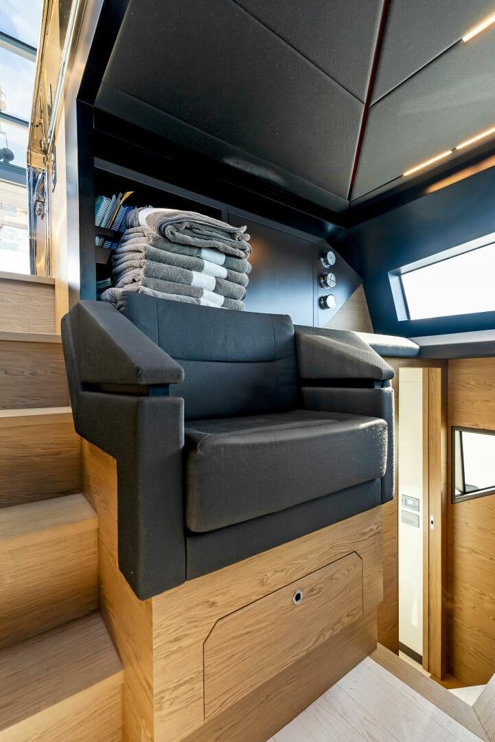 a couch in a room aboard SILHOUETTE Yacht for Sale