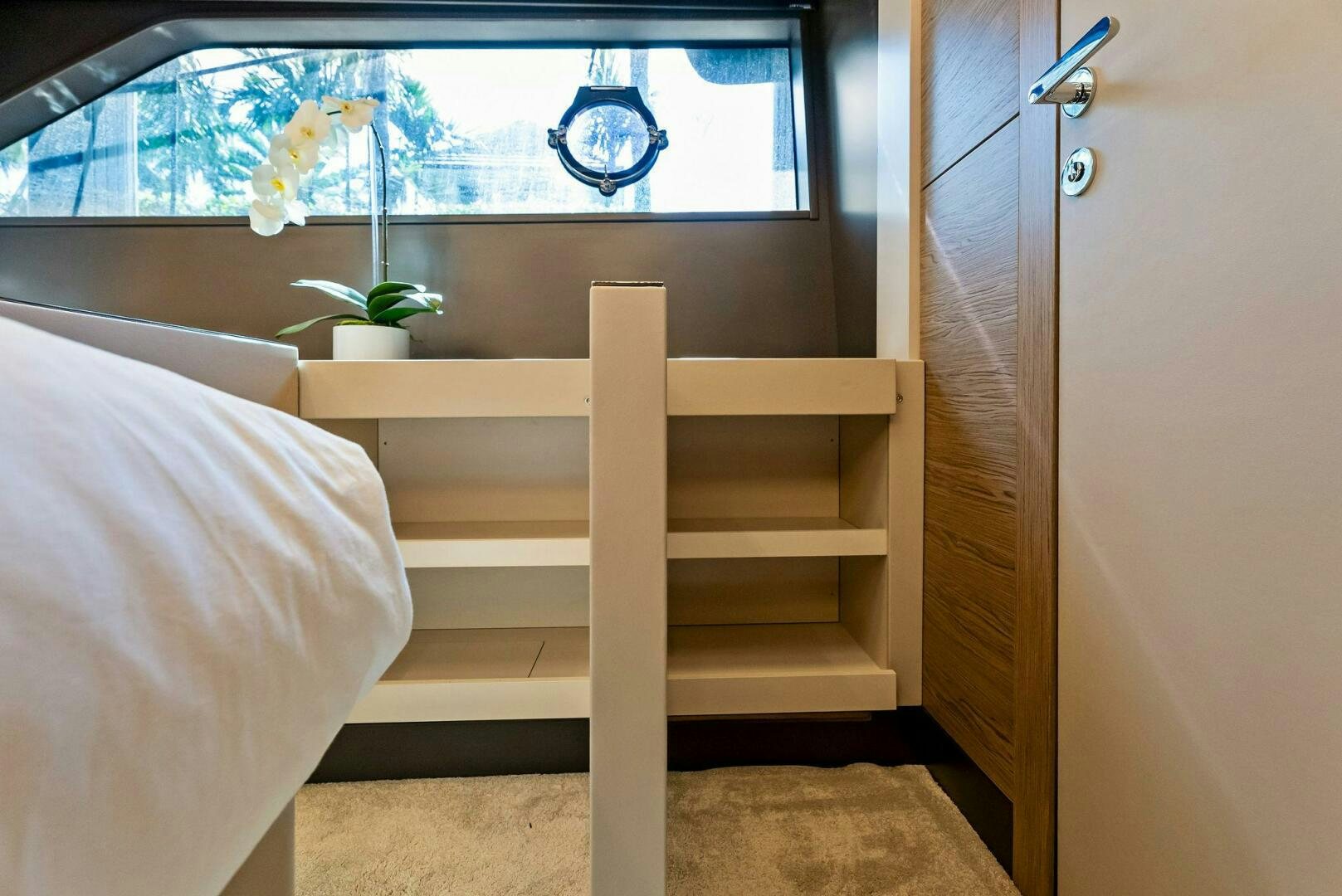 a bed with a white bed frame aboard SILHOUETTE Yacht for Sale