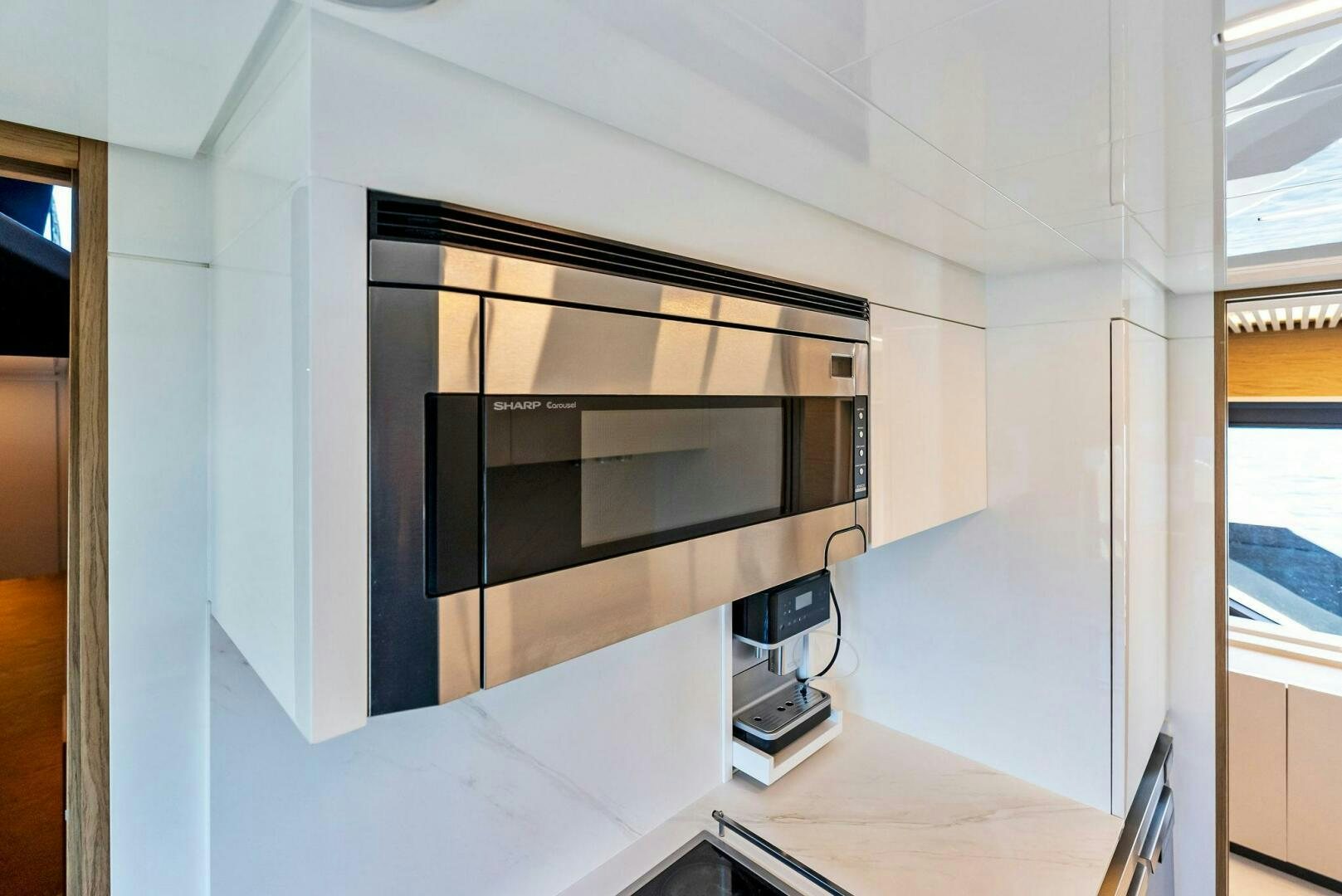 a black rectangular object with a white surface and a black rectangular object aboard SILHOUETTE Yacht for Sale