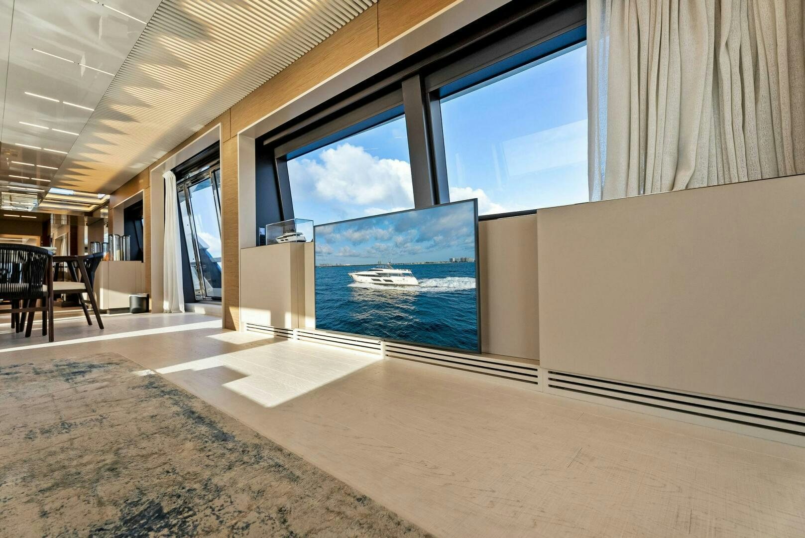 a room with a large screen aboard SILHOUETTE Yacht for Sale