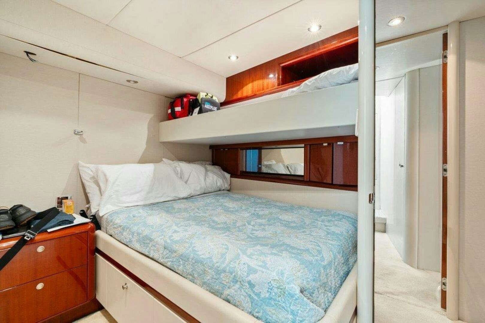 a bedroom with a bunk bed aboard FOMO2 Yacht for Sale