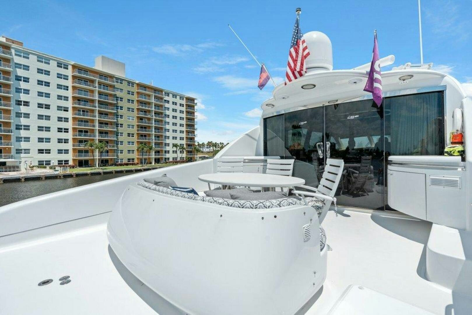 a white boat in a snowy area aboard FOMO2 Yacht for Sale