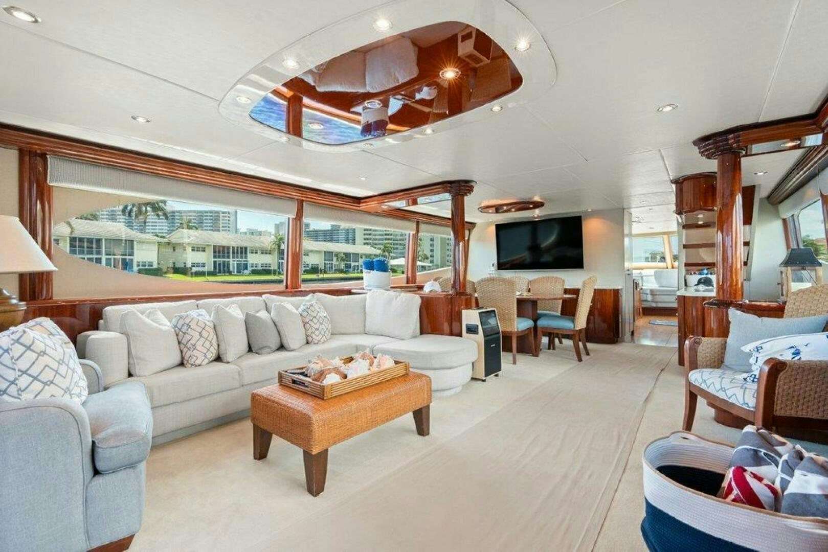 a living room with a large ceiling aboard FOMO2 Yacht for Sale