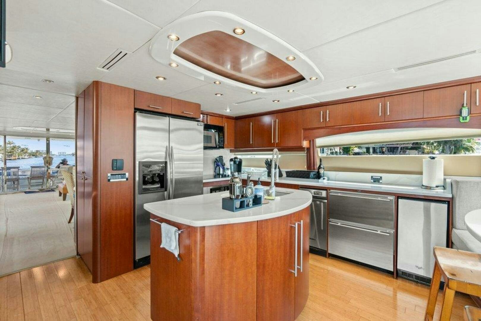 a kitchen with a ceiling fan aboard FOMO2 Yacht for Sale