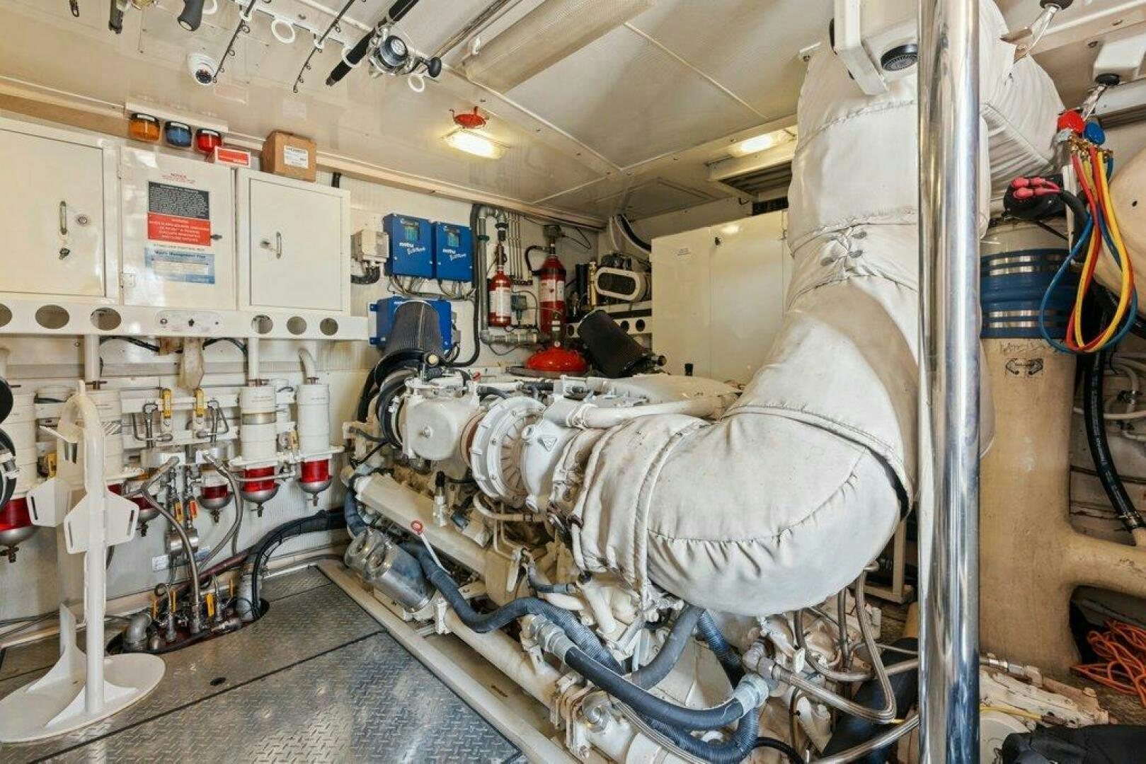 a large white machine with a large white object in it aboard FOMO2 Yacht for Sale