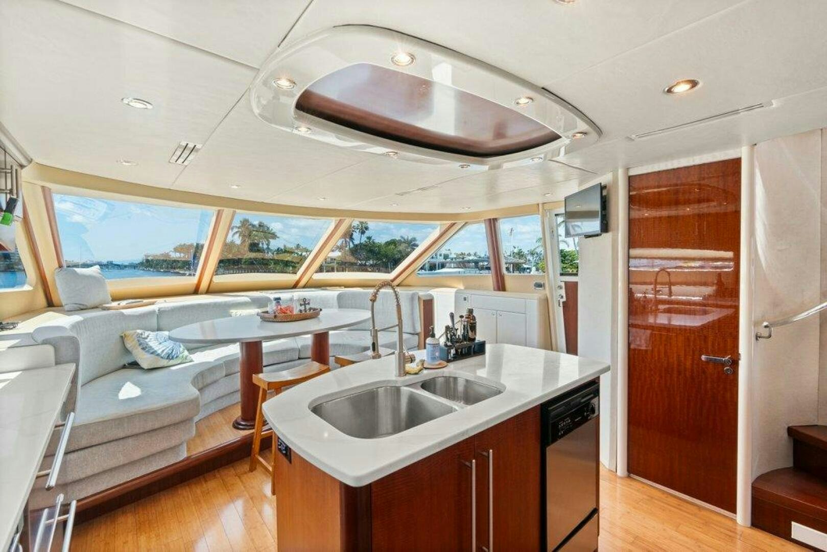 a kitchen with a large island aboard FOMO2 Yacht for Sale