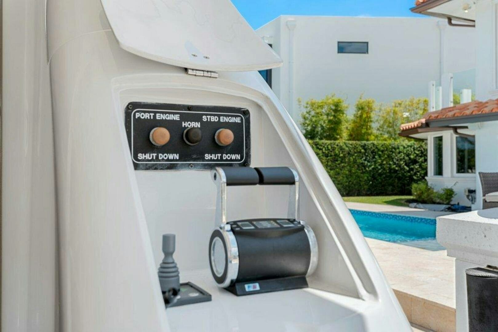 a close-up of a white car aboard FOMO2 Yacht for Sale