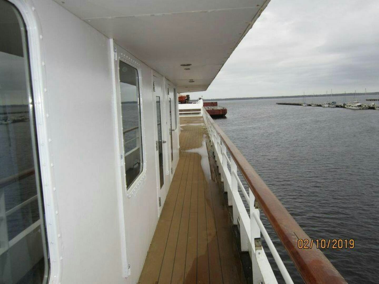 a boat on the water aboard AMERICANA Yacht for Sale