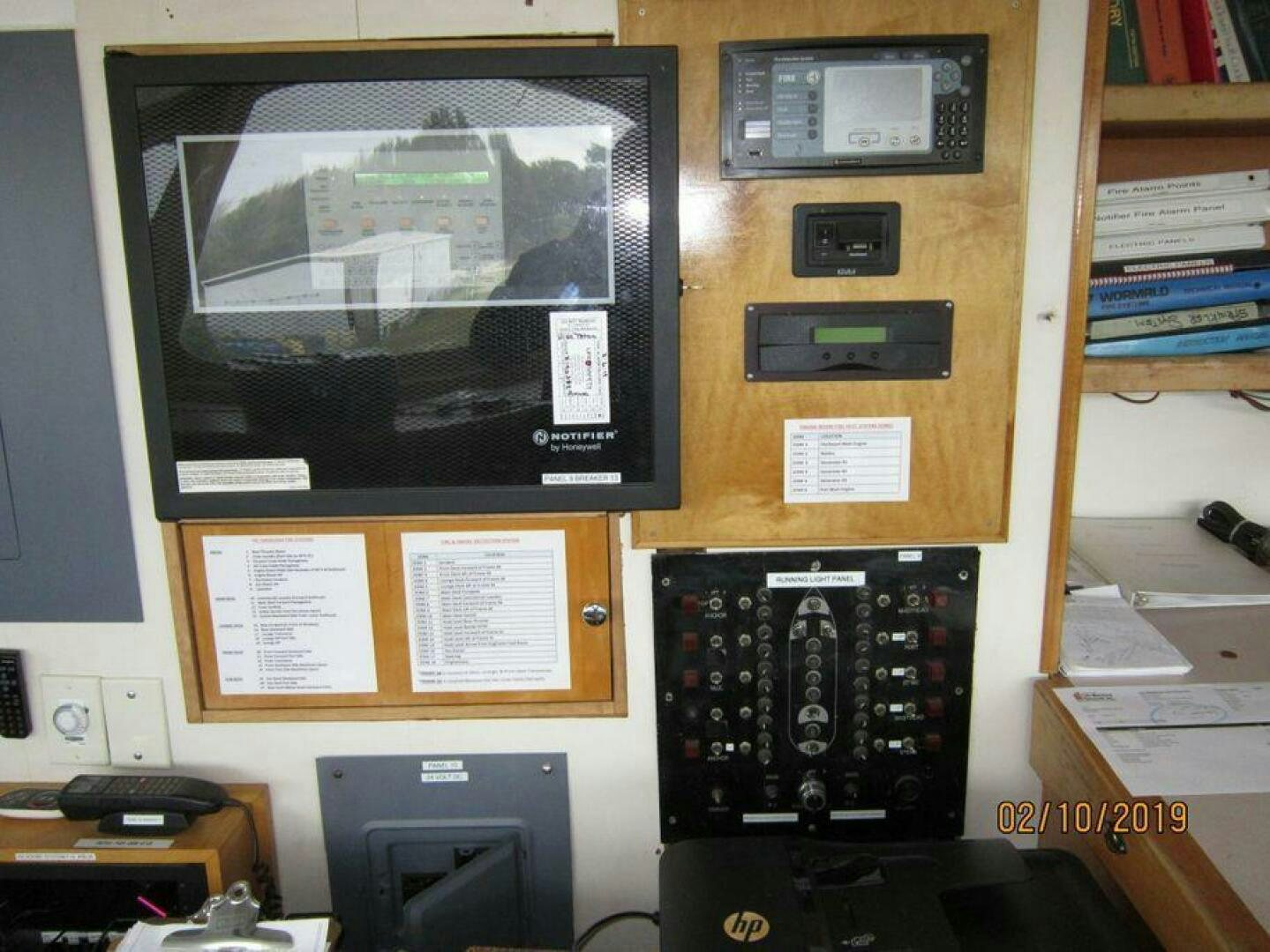a tv on a wall aboard AMERICANA Yacht for Sale