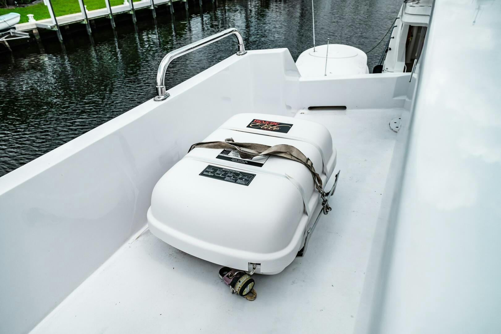 a white boat with a strap on the front aboard GLORIAS SUN Yacht for Sale