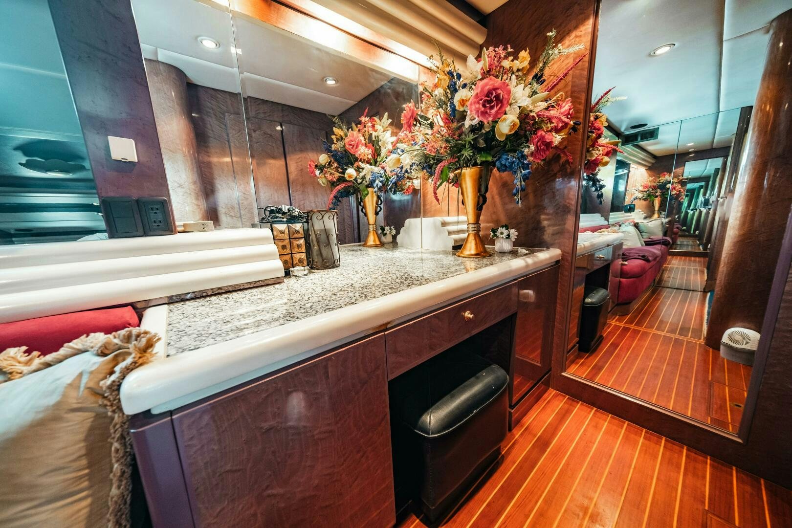 a kitchen with a counter and chairs aboard GLORIAS SUN Yacht for Sale