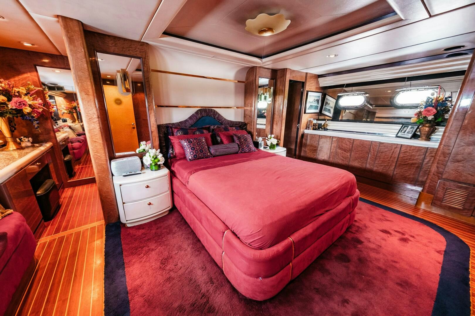 a bedroom with a large bed aboard GLORIAS SUN Yacht for Sale