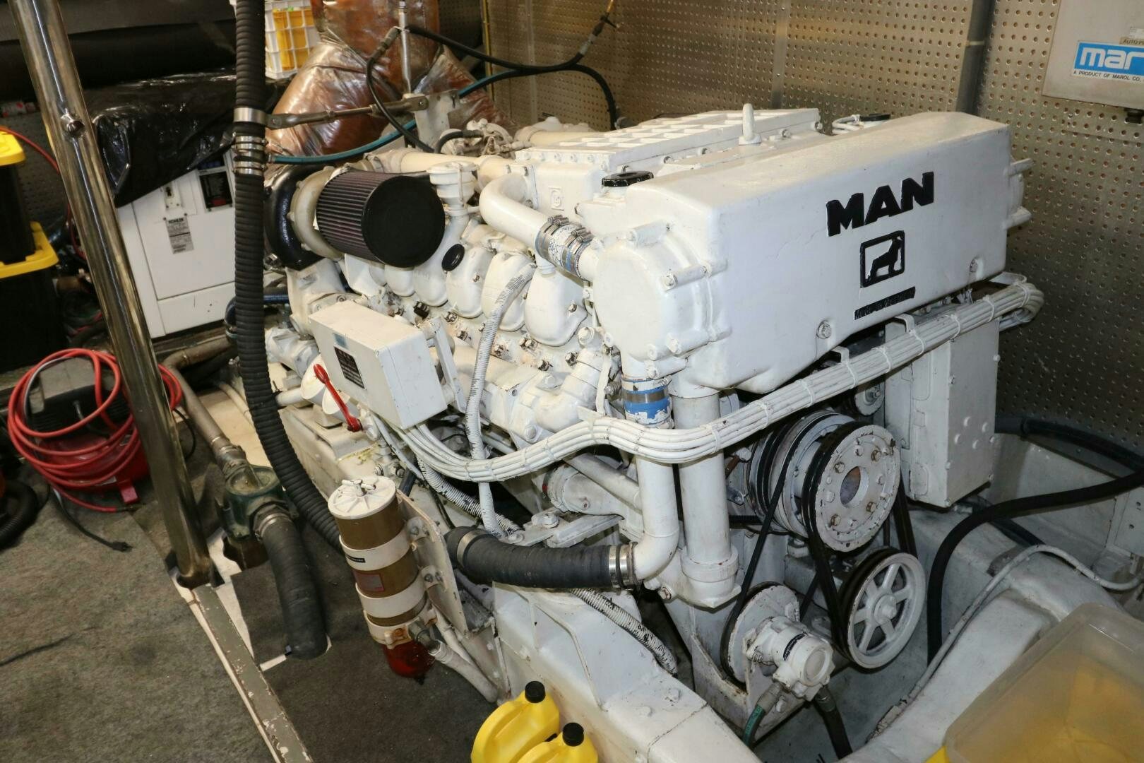 a machine with a large metal object on the side aboard GLORIAS SUN Yacht for Sale