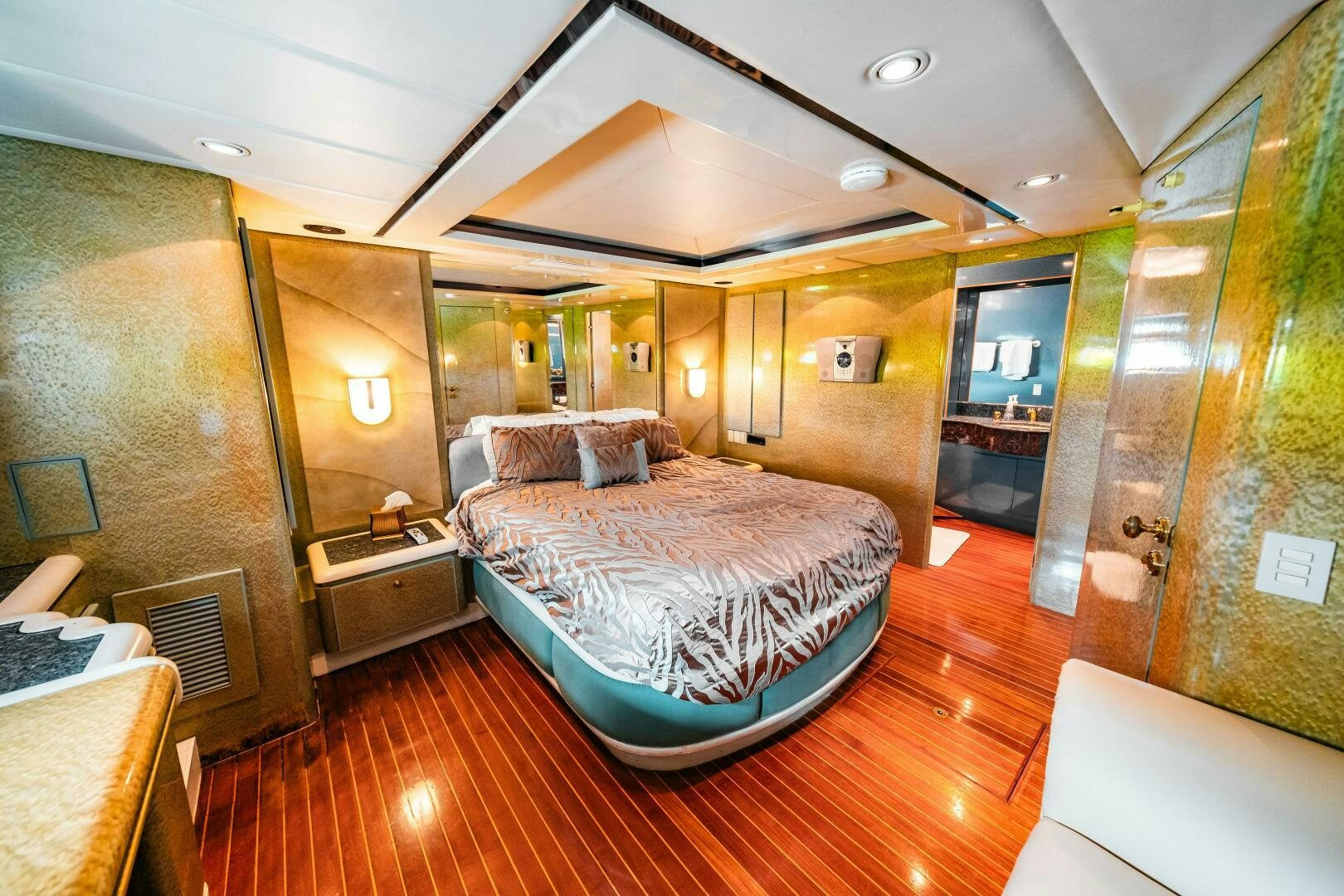 a bedroom with a bed aboard GLORIAS SUN Yacht for Sale