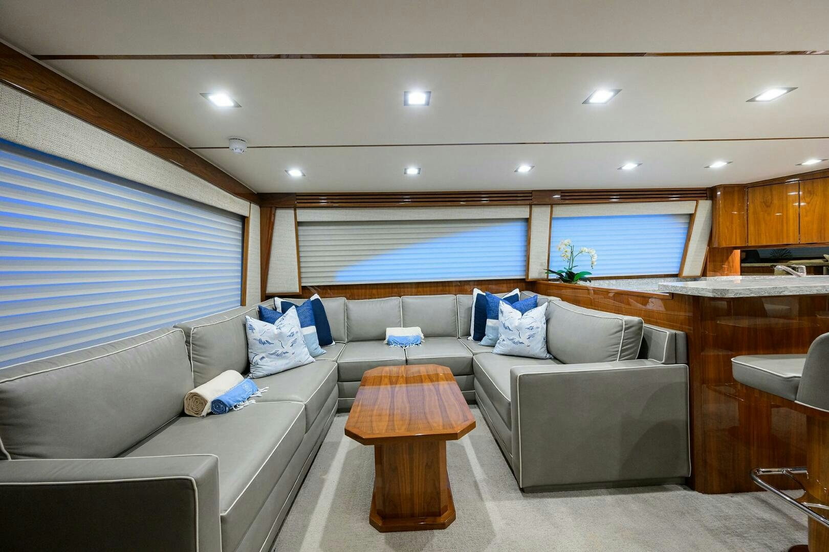 a living room with a couch and a table aboard BACCHUS Yacht for Sale