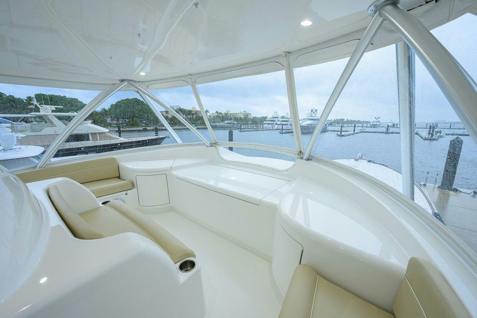 a white boat with a large window aboard BACCHUS Yacht for Sale