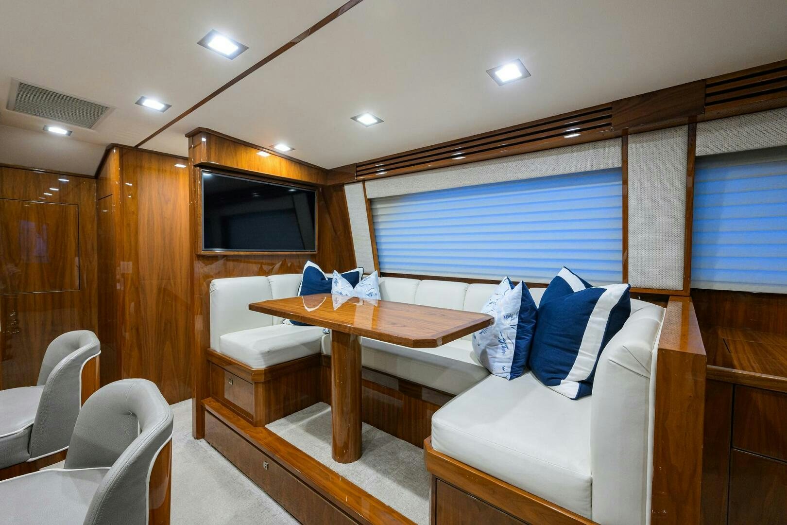 a room with a table and chairs aboard BACCHUS Yacht for Sale