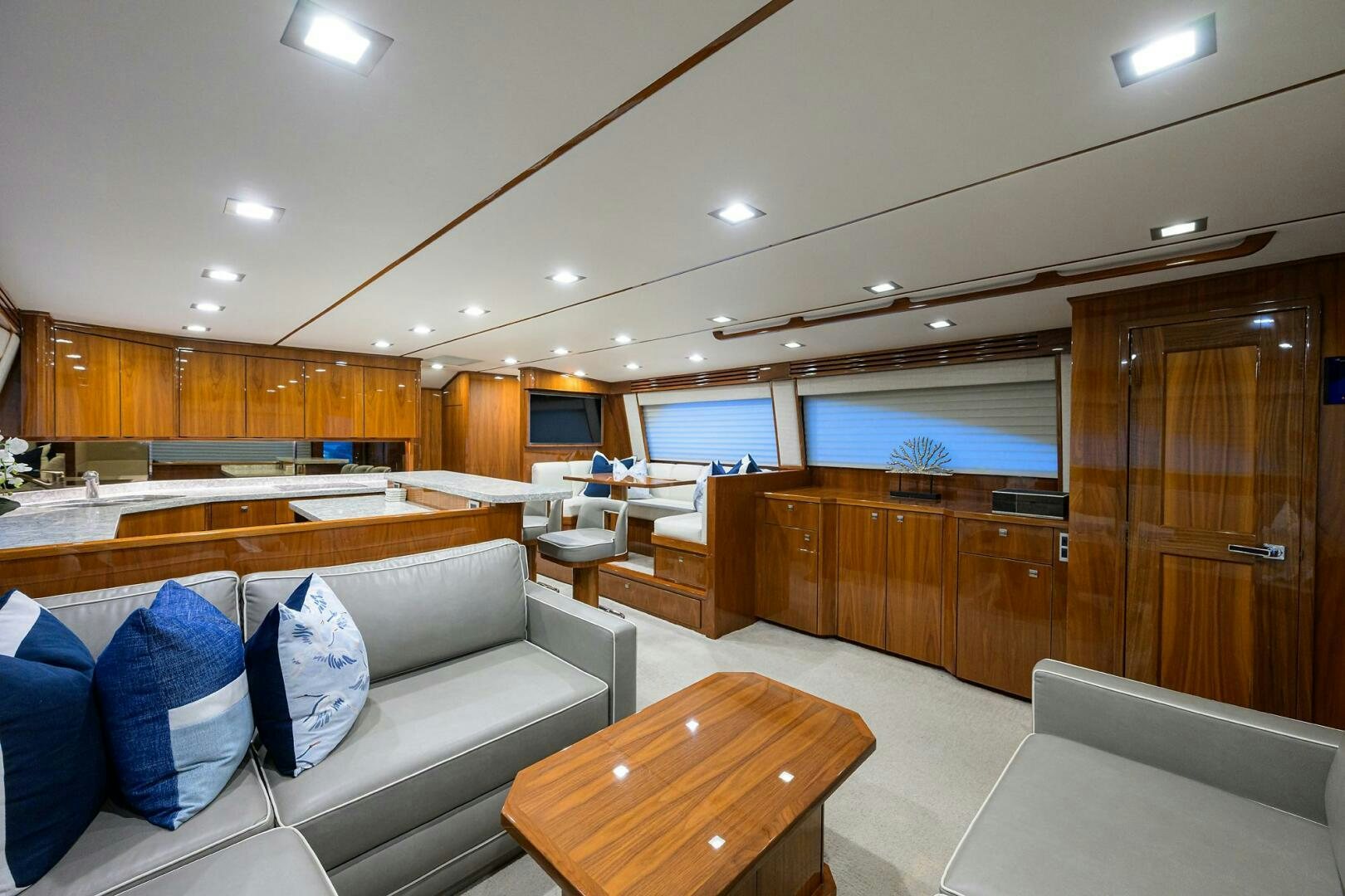 a room with a couch and a table aboard BACCHUS Yacht for Sale