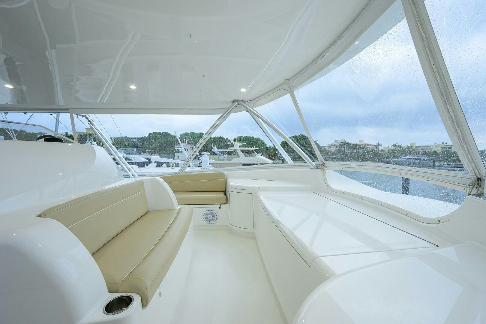 a room with a large window and a view of the water aboard BACCHUS Yacht for Sale