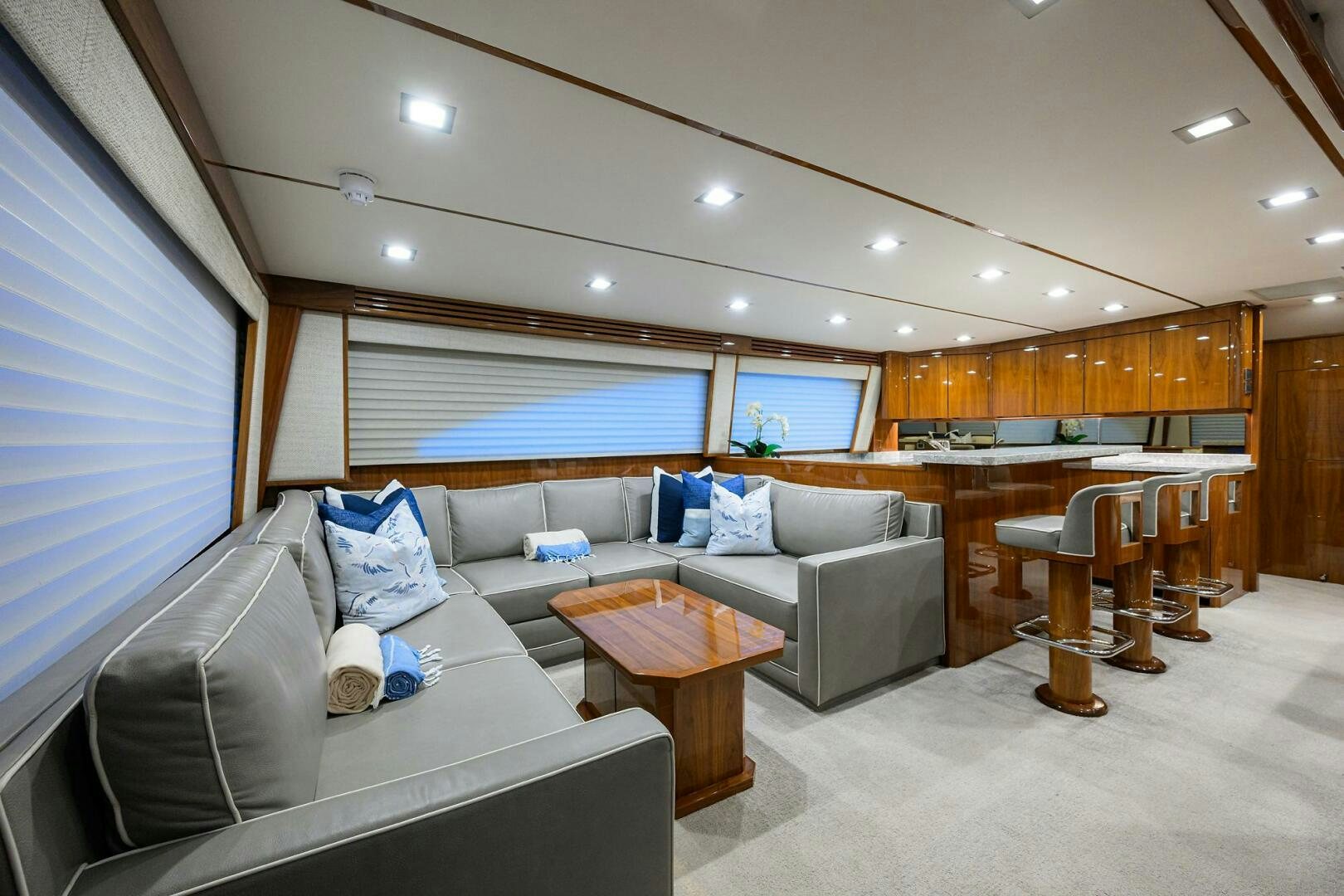 a living room with a couch and a table aboard BACCHUS Yacht for Sale