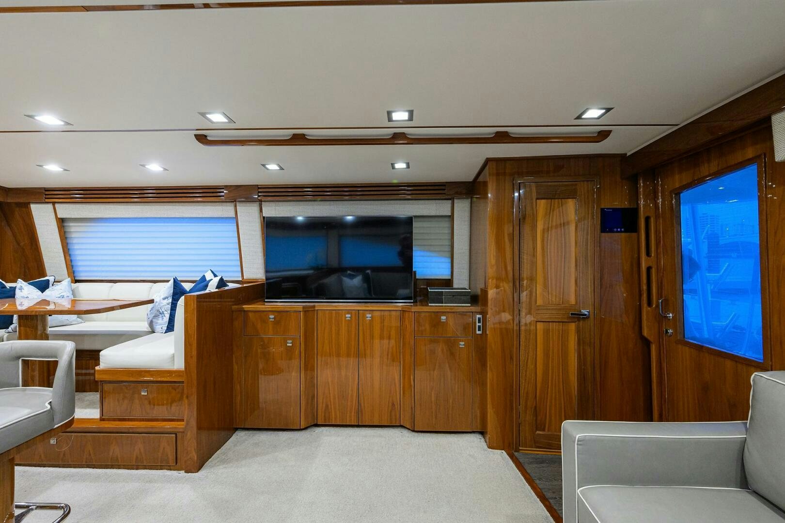 a room with a couch and a television aboard BACCHUS Yacht for Sale