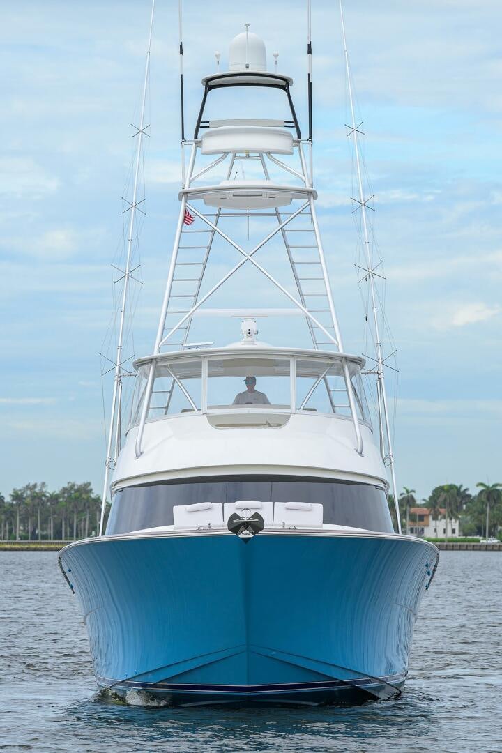 a white boat on water aboard BACCHUS Yacht for Sale