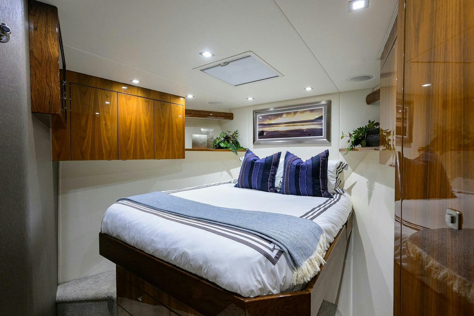 a bed in a room aboard BACCHUS Yacht for Sale