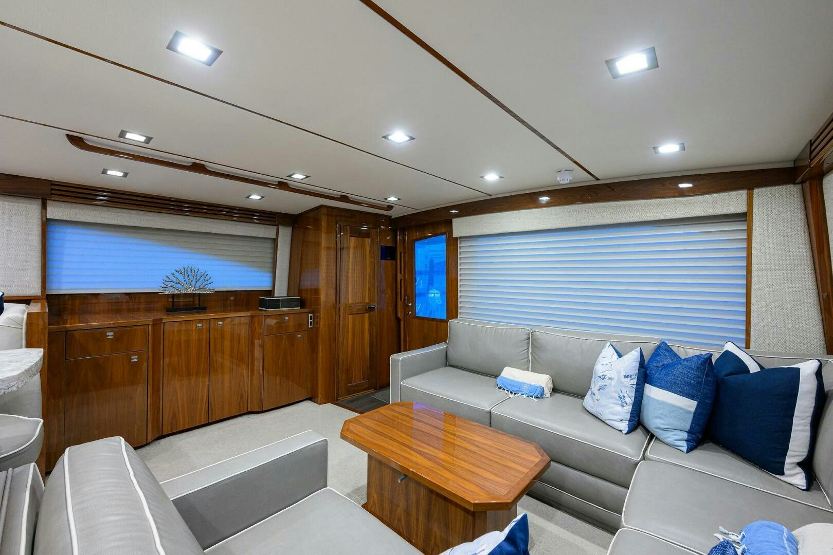a living room with a couch and a table aboard BACCHUS Yacht for Sale