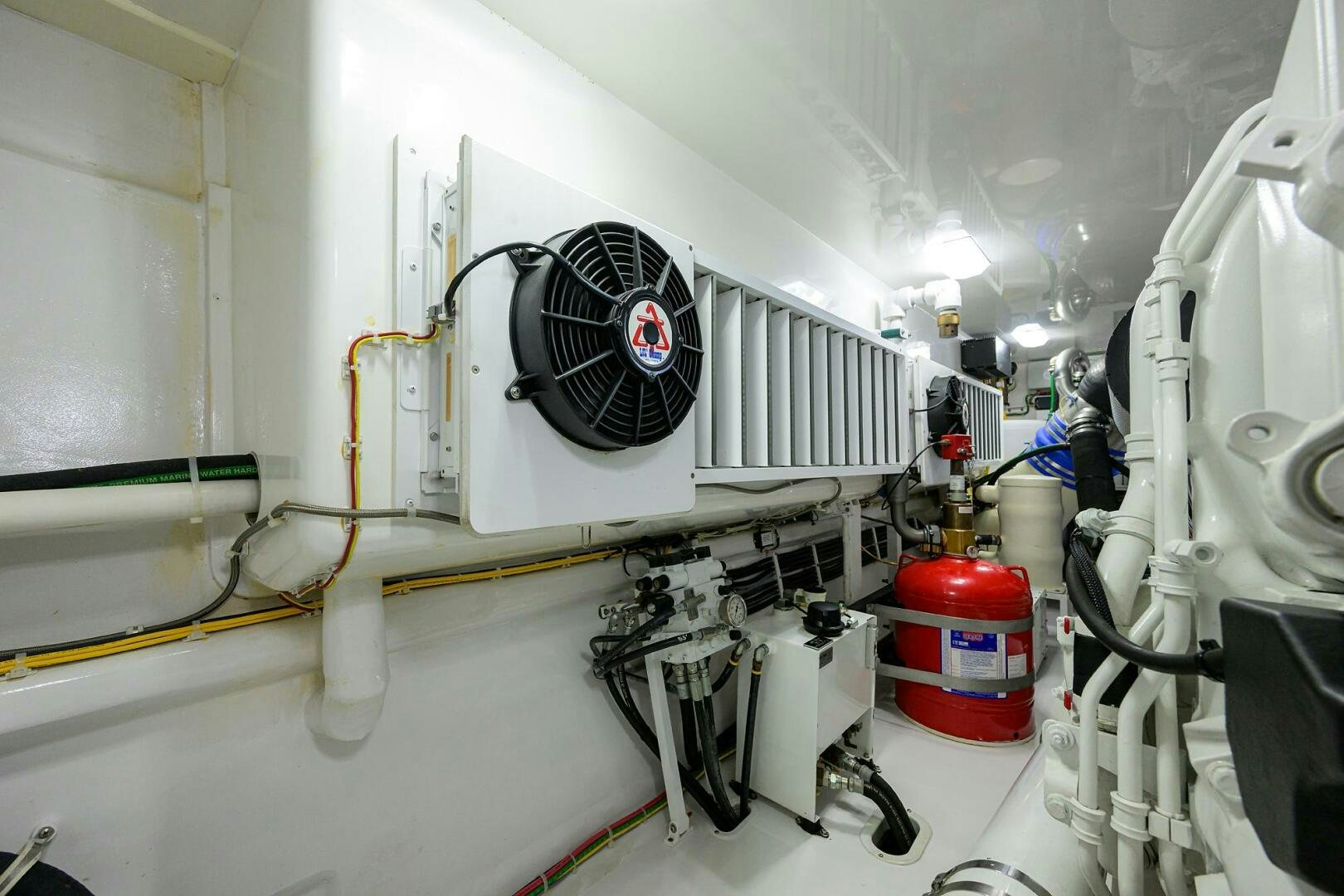 a white machine with a round black object on it aboard BACCHUS Yacht for Sale