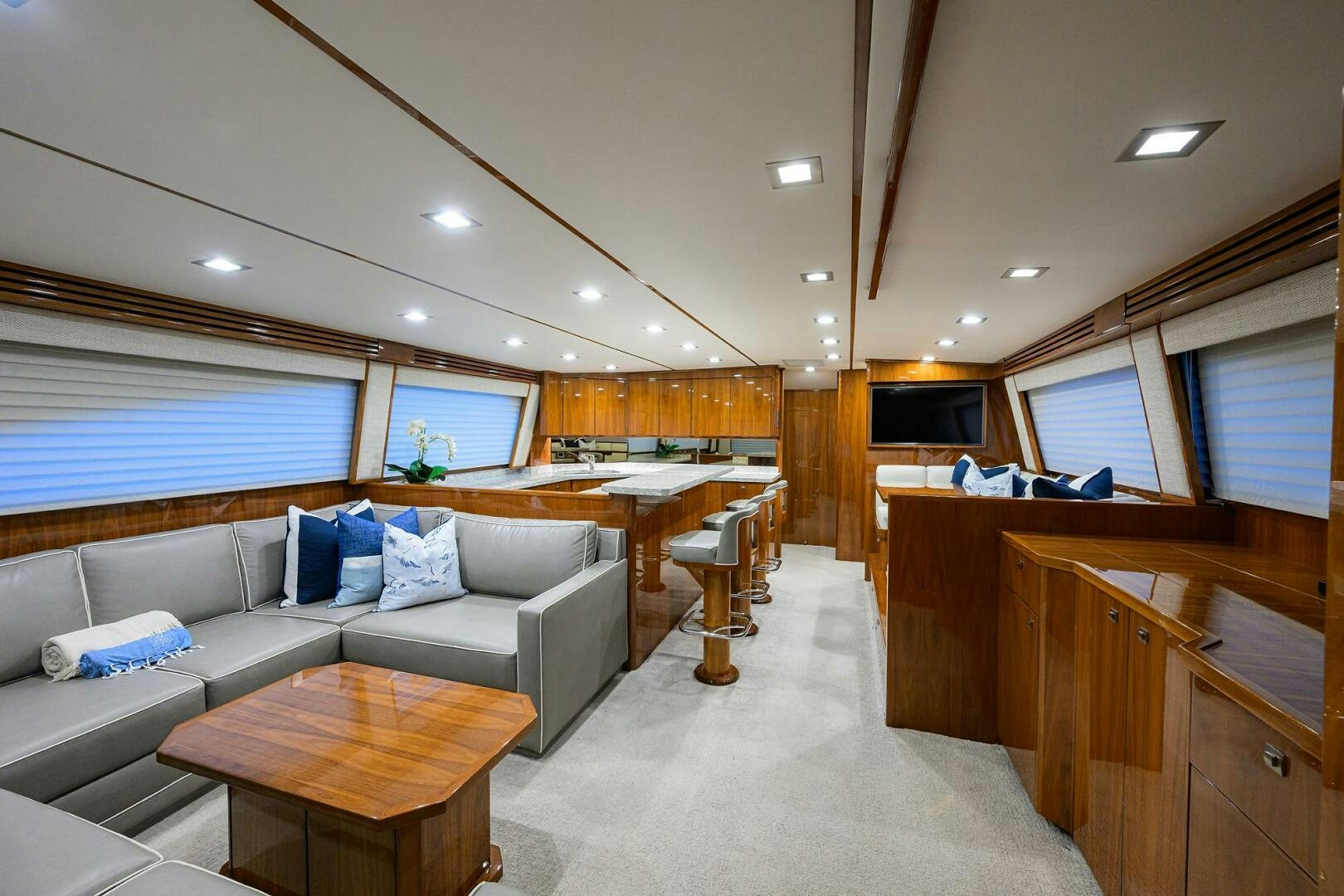a living room with a couch and a table aboard BACCHUS Yacht for Sale