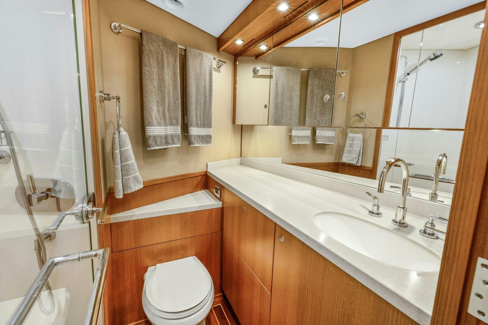 a bathroom with a sink and toilet aboard SALTY K Yacht for Sale