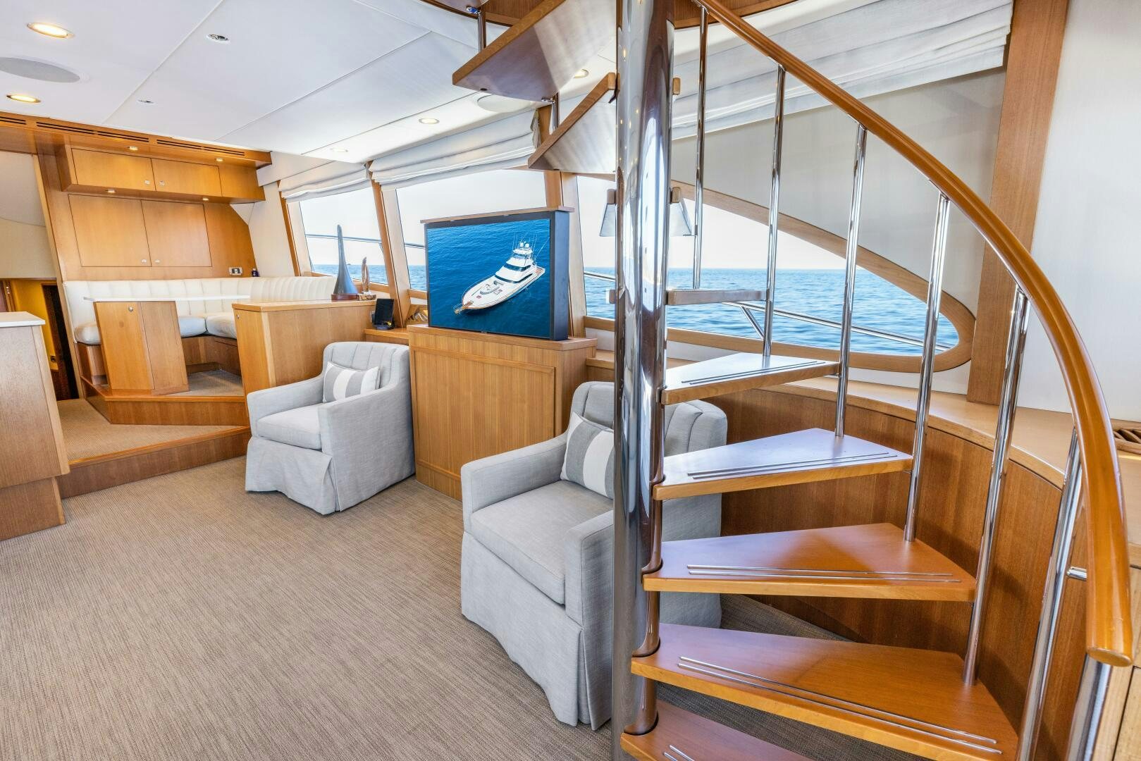 a room with a bunk bed and a couch aboard SALTY K Yacht for Sale