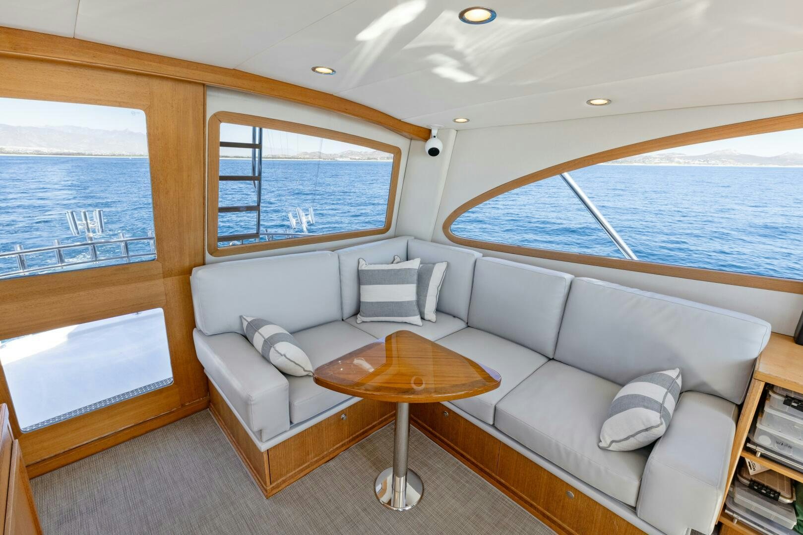 a living room with a couch and a table aboard SALTY K Yacht for Sale
