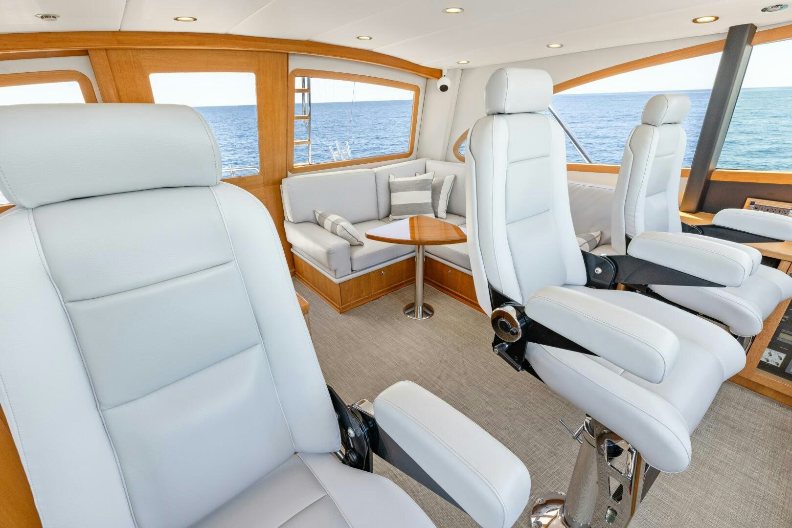 a room with a couch and a table aboard SALTY K Yacht for Sale