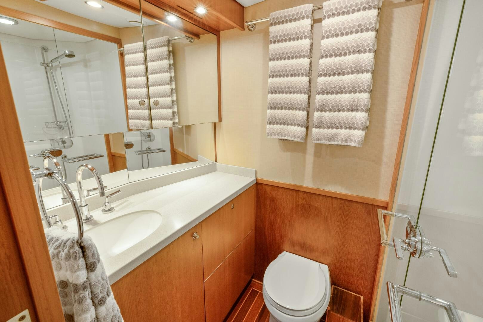a bathroom with a sink and toilet aboard SALTY K Yacht for Sale