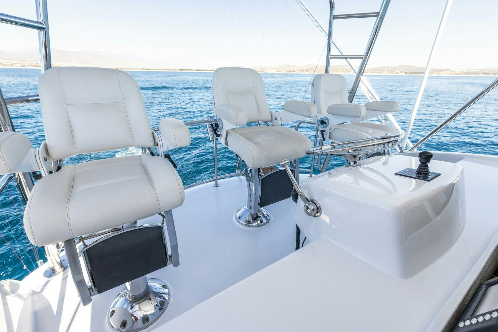 a boat with seats on the deck aboard SALTY K Yacht for Sale