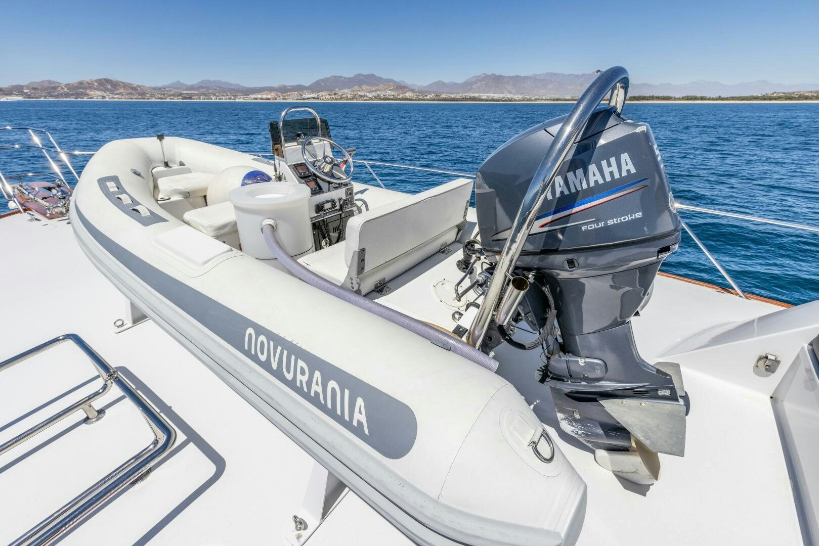 a boat with a steering wheel aboard SALTY K Yacht for Sale