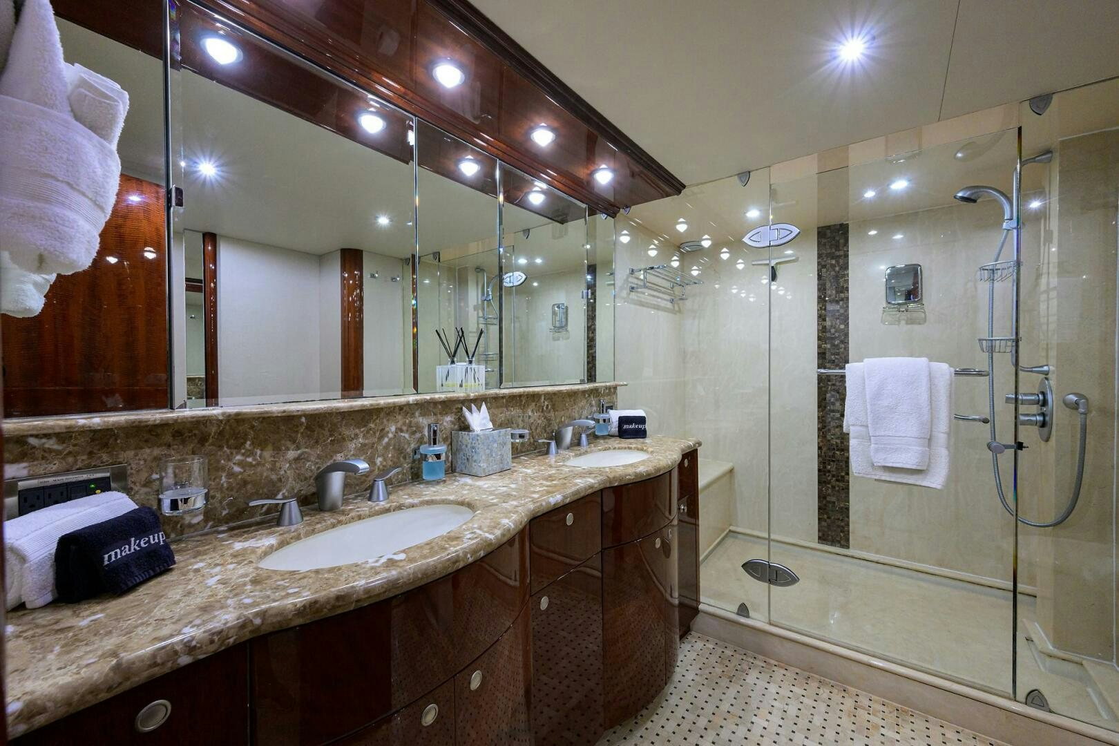 a bathroom with a large mirror aboard ALWAYS BAREFOOT Yacht for Sale